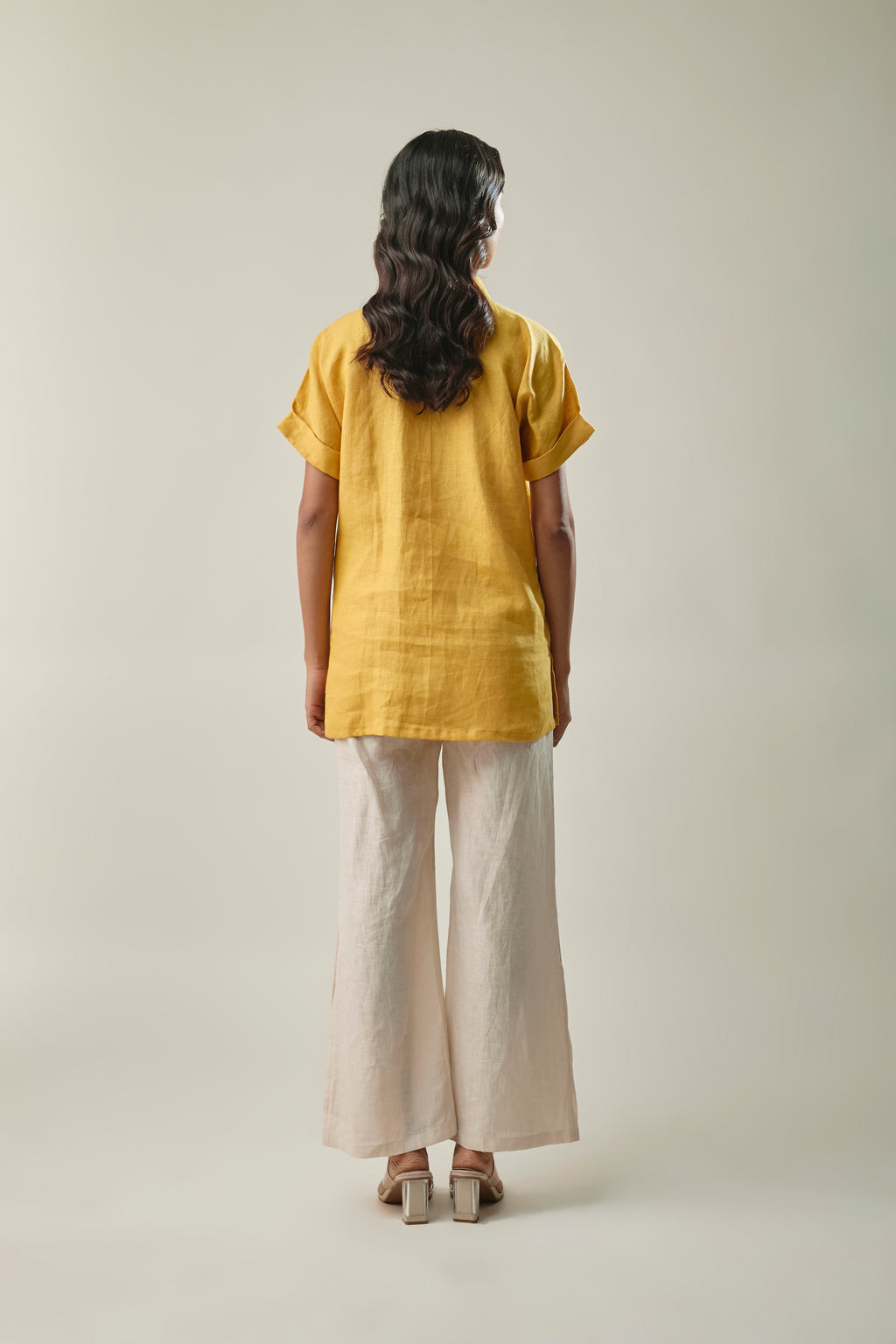 Model wearing mustard & ivory pure linen co-ord set