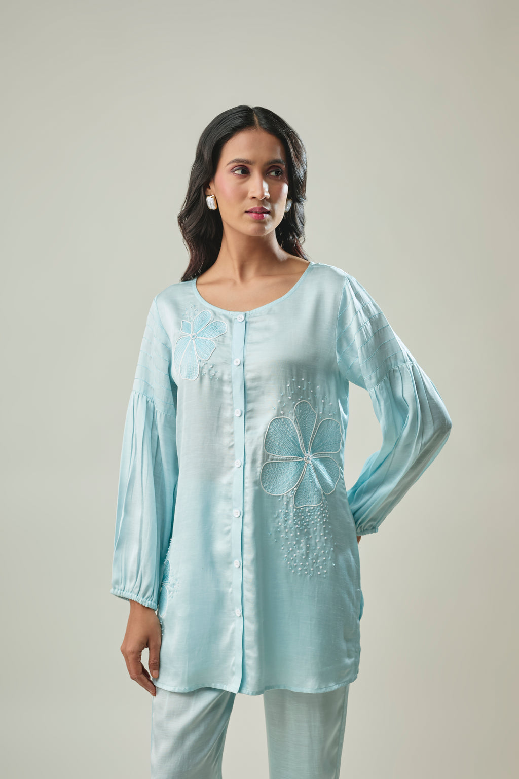 Model wearing sky blue satin linen co-ord set