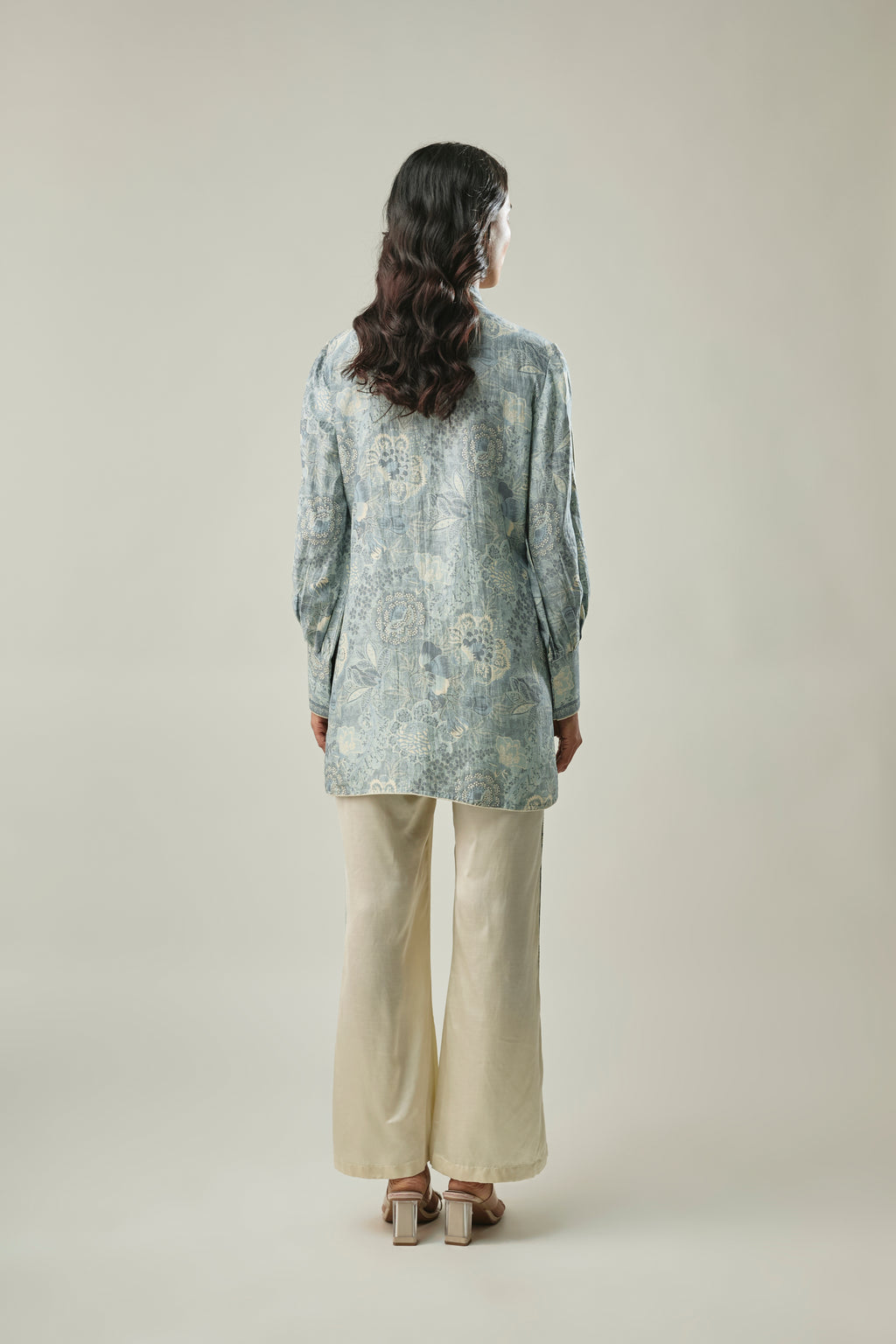 Model wearing ice blue & ivory satin linen co-ord set